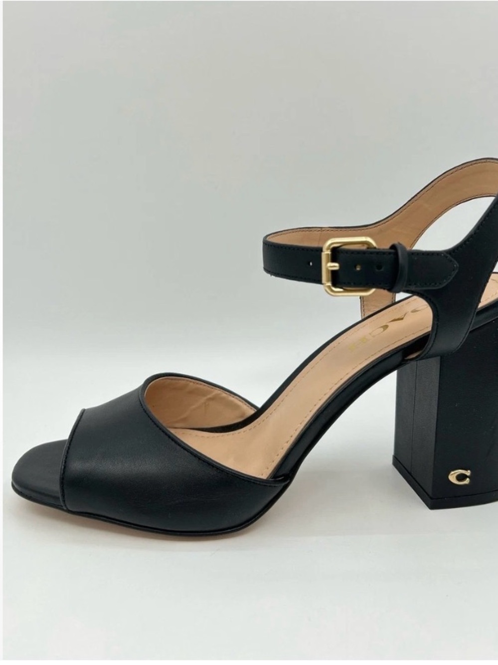 Coach Women's Marla Leather Sandal
Size 7 color black